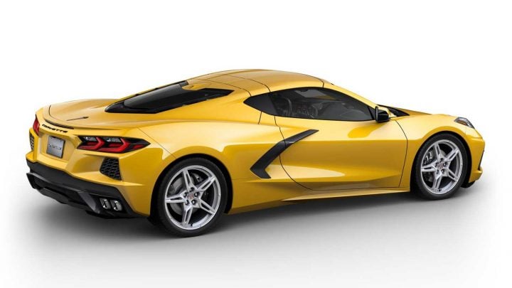 Side rear three quarters view of the 2025 Corvette in Competition Yellow Tintcoat Metallic.