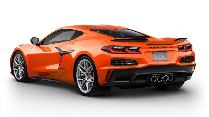 Rear three quarters view of the 2025 Corvette in Sebring Orange Tintcoat.