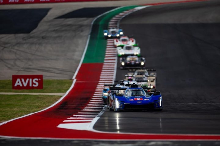 Cadillac Racing managed a fourth-place finish at COTA. Shown here is the No. 2 Cadillac V-Series.R ahead of a pack of race cars on the track.