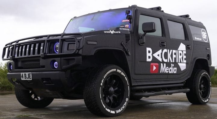 A Hummer H2 gets ready for a drag race.