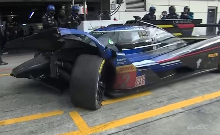 Image of the heavily damaged No. 2 Cadillac Racing V-Series.R at the pit stand.