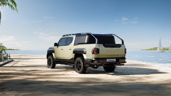 Kia Tasman rear three quarter angle.