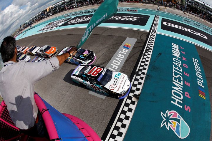Chandler Smith's No. 81 NASCAR Chevy Camaro ahead of the pack on the Homestead-Miami racetrack.