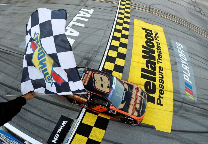 Photo showing the No. 8 Chevy crossing the finish line in the Xfinity Series. Lamar Jackson went after Dale Jr. for his use of the number. 