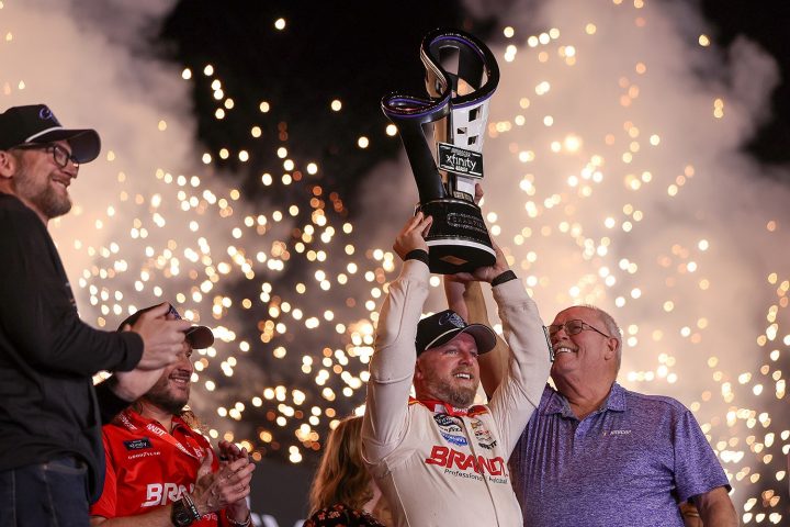 NASCAR Chevy driver Justin Allgaier celebrating his championship win. 