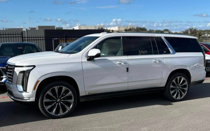 The exterior of the 2025 Cadillac Escalade ESV in Crystal White Tricoat paint.