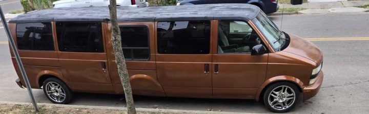 2002 Chevy Astro limo passenger side profile.