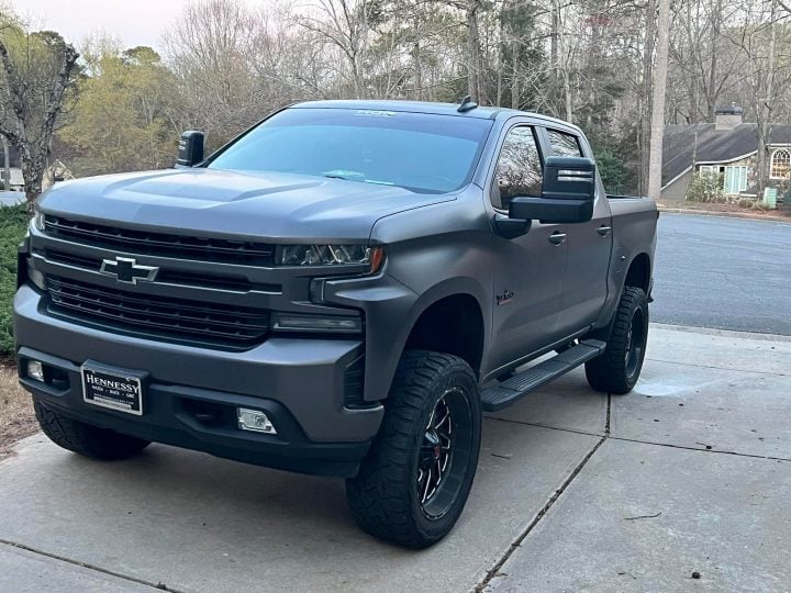 Chevy Silverado with tow mirrors.