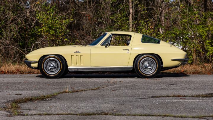 Side profile view of the Sunfire Yellow 1966 Chevy Corvette Big Block coupe headed to auction.