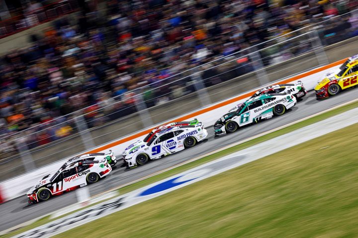 Photo of the Cup Series race at Bowman Gray, showing the drivers taking the green flag. Chase Elliott and the No. 9 NASCAR Chevy are shown in second, but would go on to win the race.