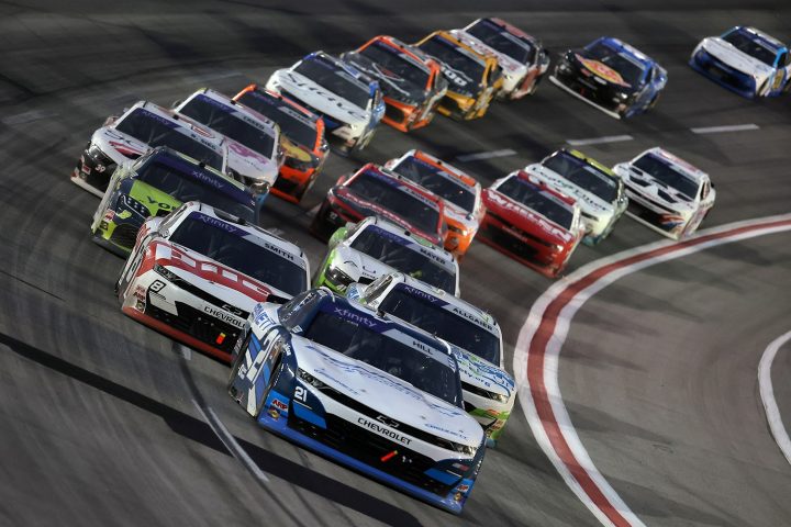 A general view of racing during the Xfinity Series race at Atlanta on February 22nd, 2025. The No. 21 NASCAR Chevy of Austin Hill is shown in the lead. 