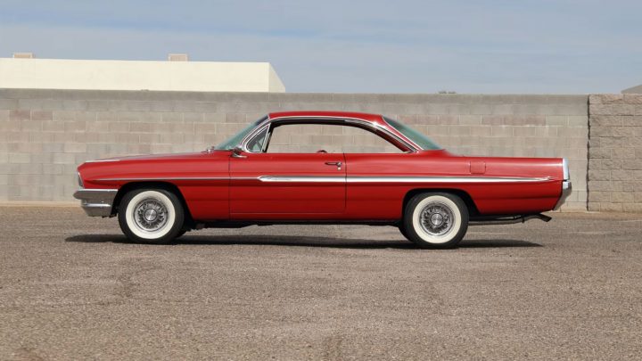 Side profile view of the 1961 Pontiac Ventura heading to auction.
