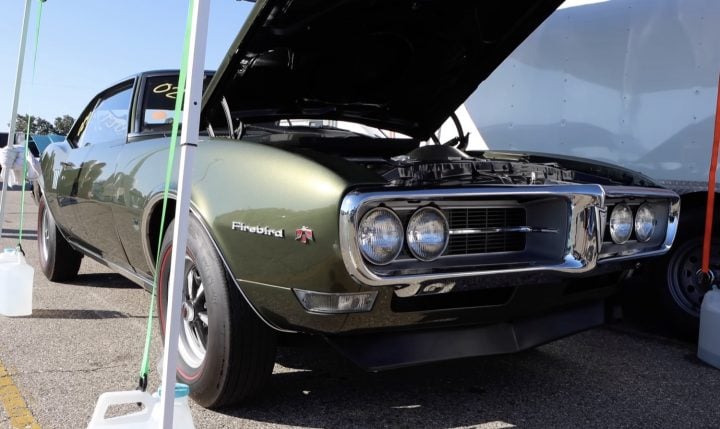 The front end of a 1968 Pontiac Firebird.