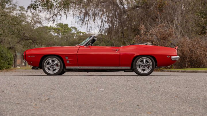 Side profile view of the 1969 Pontiac Firebird convertible heading to auction.