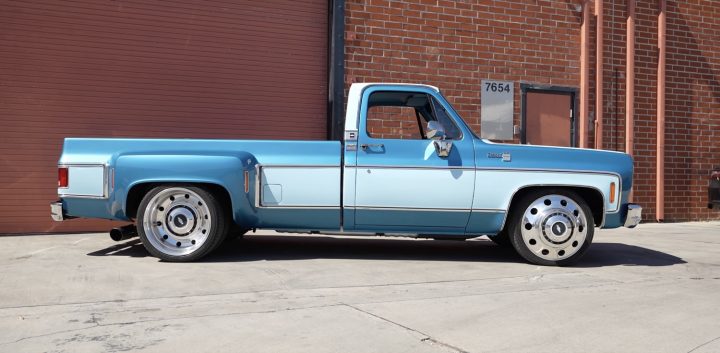 Side view of a modified 1978 Chevy C30.