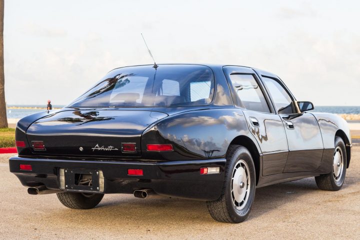 1990 Avanti Touring Sedan rear three quarter angle.