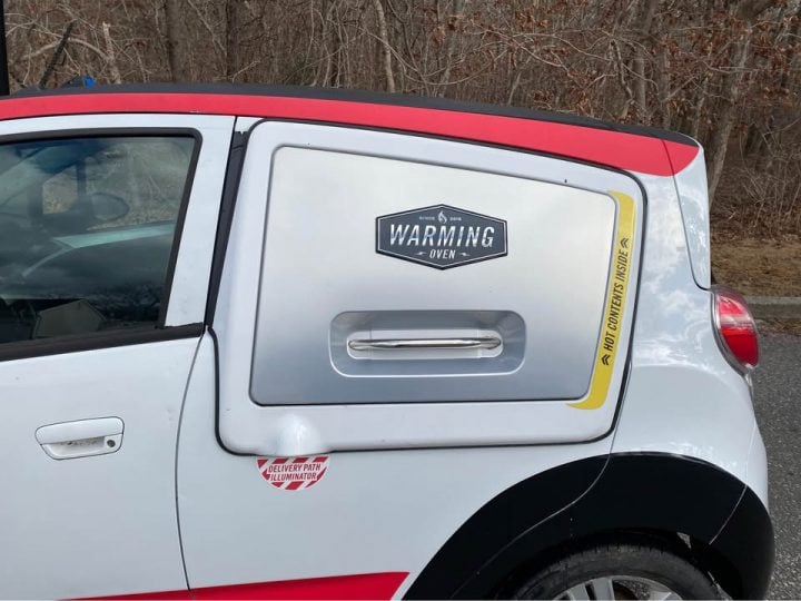 Chevy Spark based Domino's DXP warming oven closed.