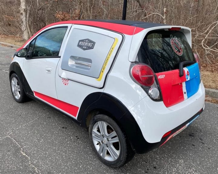 Chevy Spark based Domino's DXP rear three quarter angle.