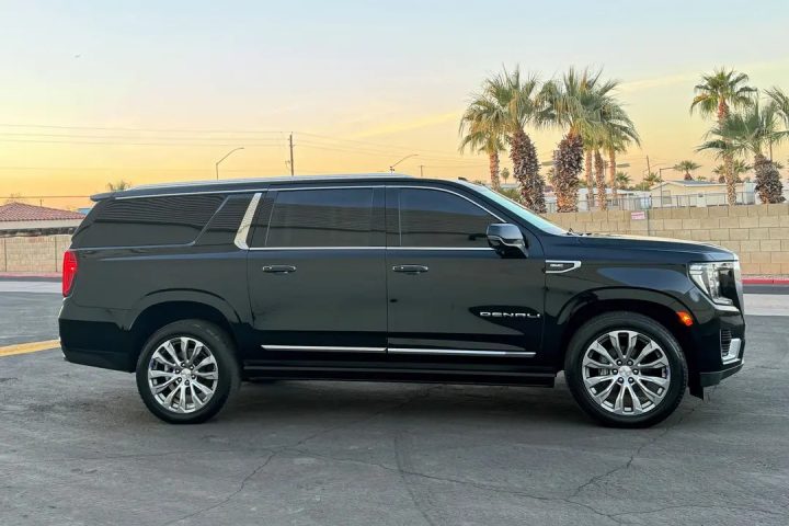 2022 GMC Yukon XL Denali armored passenger side profile.