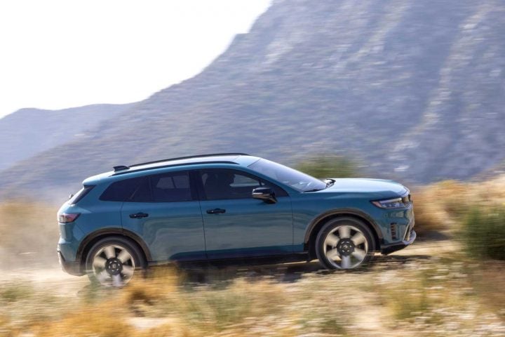 2025 Honda Prologue Elite driving on a trail.