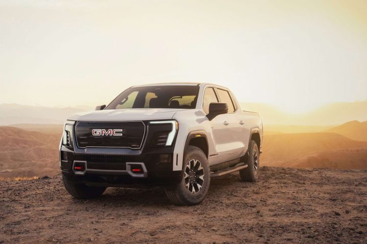The front end of the 2026 GMC Sierra EV AT4.