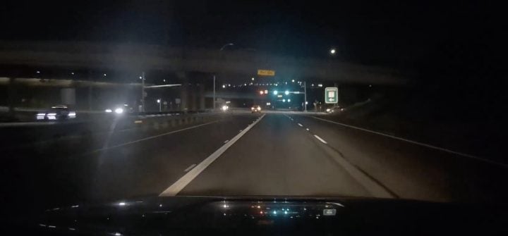 A dash cam video screenshot moments before a rear-end collision with a Buick Encore GX.