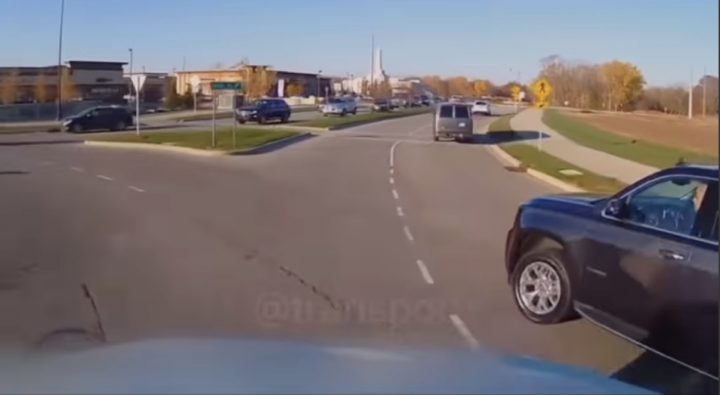 A Chevy Tahoe moments before colliding with a semi truck.