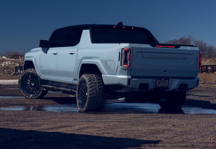 A GMC Hummer EV Pickup on custom Vossen wheels.