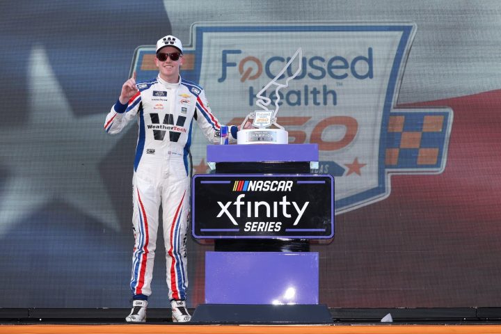 NASCAR Chevy driver Connor Zilisch celebrates in Victory Lane after winning the Xfinity Series race at COTA on March 1, 2025. 