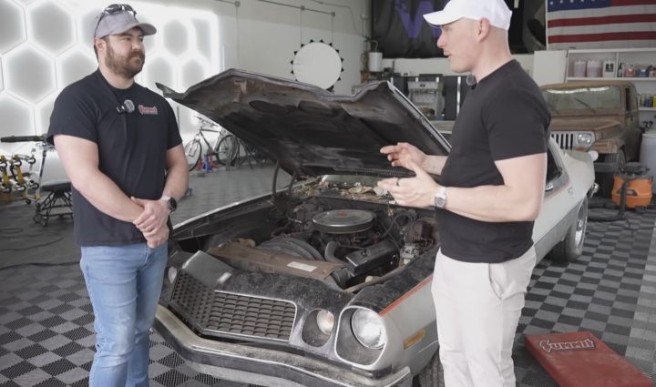 A Chevy Camaro is prepped for restoration.