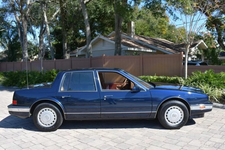 1988 Cadillac Seville passenger side profile.