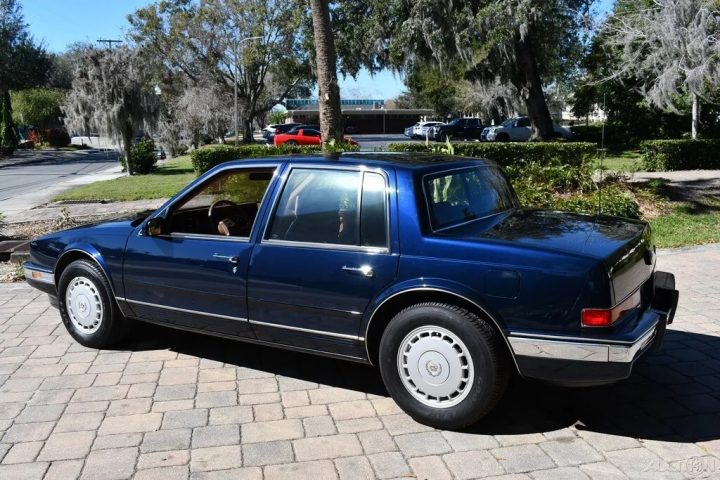 1988 Cadillac Seville rear three quarter angle.