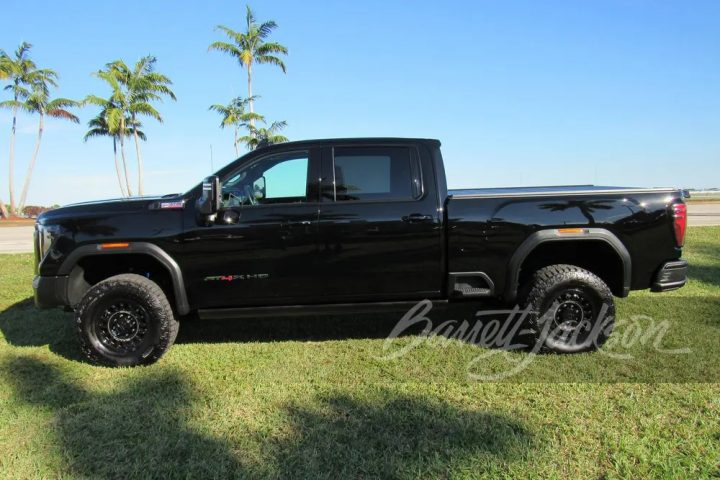 Side profile of the 2024 GMC Sierra HD AT4X AEV Edition heading to auction.