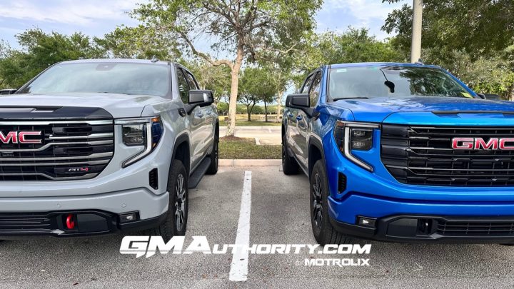 The 2025 GMC Sierra AT4 and GMC Sierra Elevation side by side.