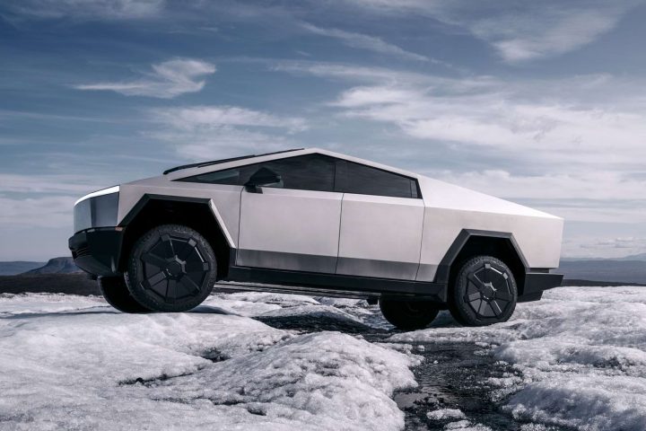 Tesla Cybertruck driving off road.