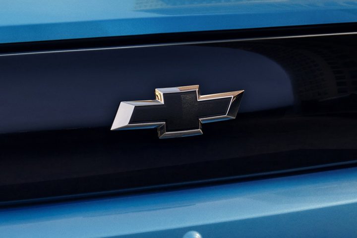 View of the Chevrolet logo on the grille of the 2026 Chevy Spark EUV.