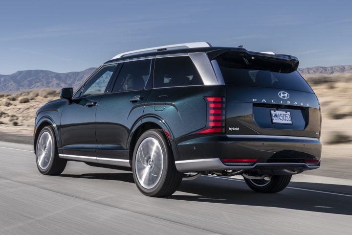 2026 Hyundai Palisade driving on a road.