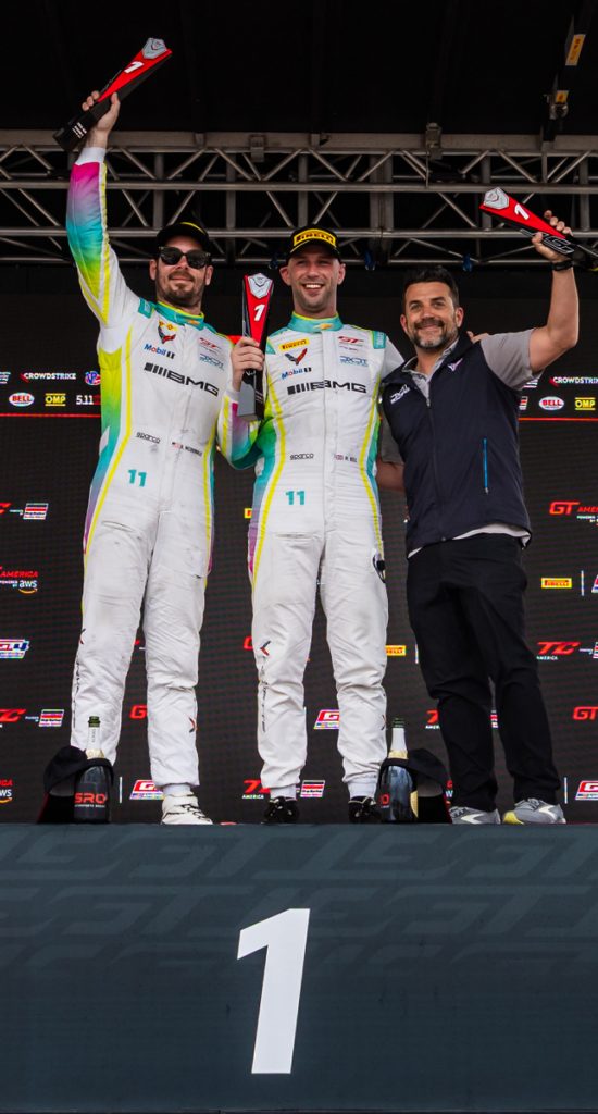 Photo of the No. 11 Corvette Racing team celebrating its Pro Am division win on the podium at COTA on April 26th, 2025.