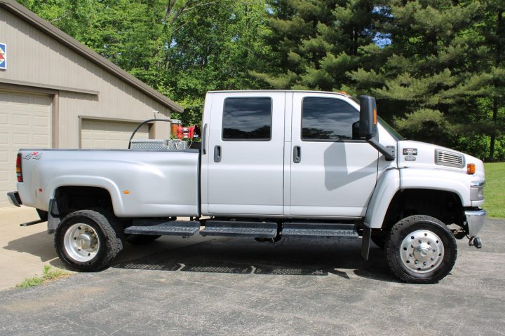 2005 GMC TopKick pickup passenger side profile.