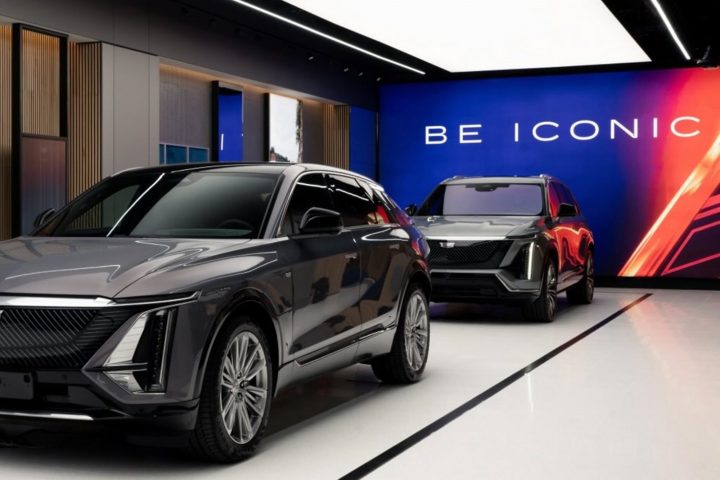 The showroom floor of the new Cadillac City Stockholm Experience Center in Sweden, showcasing the Lyriq and Vistiq crossovers.