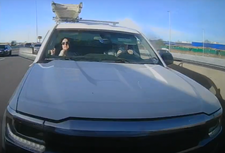 Chevy Silverado crashing into a Nissan Rogue.