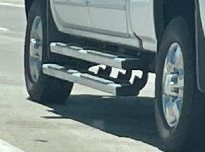 Dual running boards on a GMC Sierra HD.