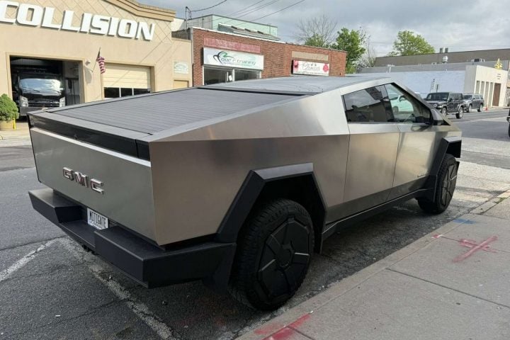 Tesla Cybertruck rear three quarter angle.