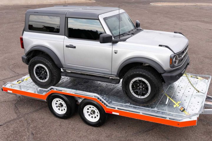 The U-Haul Toy Hauler with a Ford Bronco loaded. 