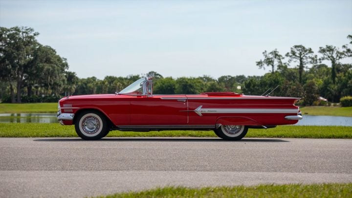 Side profile view of the 1960 Chevy Impala convertible heading to auction in Florida.