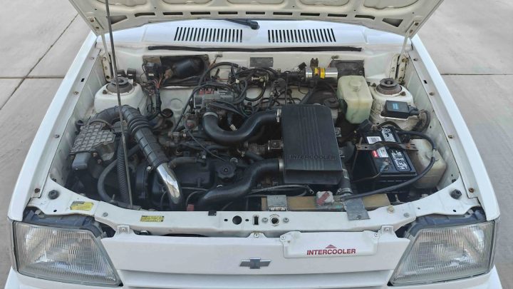 1987 Chevy Sprint Turbo engine bay.