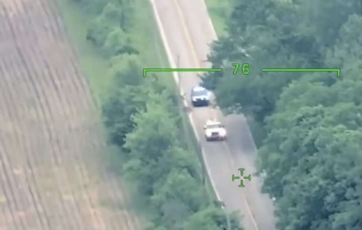 A GMC Sierra runs from police.
