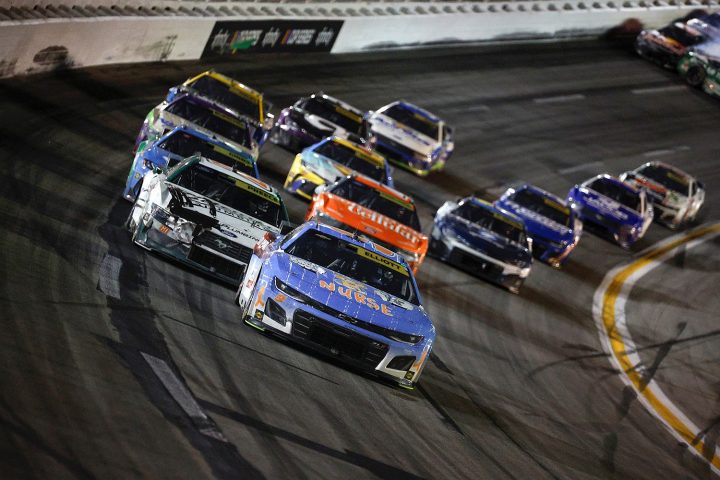 General view of racing in the Cup Series race at Atlanta on June 28th, 2025, showing Chase Elliott and the No. 9 NASCAR Chevy out front. 