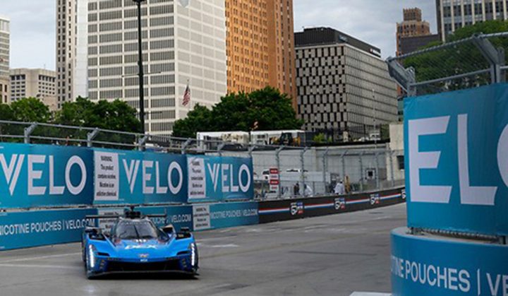 Photo of the No. 10 Cadillac Racing V-Series.R on track in Detroit. The team would ultimately finish P2 in the GTP division.