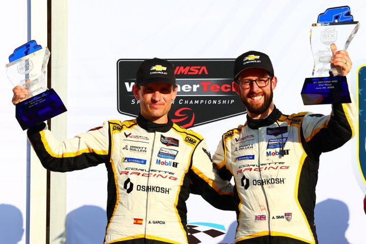 Photo of the No. 3 Corvette Racing team celebrating their podium finish at Watkins Glen. They now move into the GTD Pro points lead.